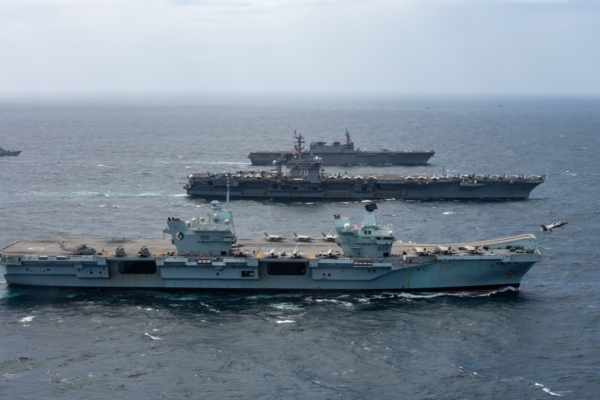 211017-N-BC658-1328 BAY OF BENGAL (Oct. 17, 2021) An F-35B Lightning II, assigned to the “Wake Island Avengers” of Marine Strike Fighter Squadron (VFMA) 211, launches from the flight deck of U.K. Royal Navy aircraft carrier HMS Queen Elizabeth (R 08), while the ship steams alongside Nimitz-class aircraft carrier USS Carl Vinson (CVN 70), and Japan Maritime Self- Defense Force Izumo-class helicopter destroyer JS Kaga (DDH 184), as the ships transit the Bay of Bengal as part of Maritime Partnership Exercise (MPX), Oct. 17, 2021. MPX 2021 is a multilateral maritime exercise between the Royal Australian Navy, Japan Maritime Self Defense, U.K. Royal Navy, and U.S. maritime forces, focused on naval cooperation, interoperability and regional security and stability in the Indo-Pacific and is an example of the enduring partnership between Australian, Japanese, U.K. and U.S. maritime forces, who routinely operate together in the Indo-Pacific, fostering a cooperative approach toward regional security and stability. (U.S. Navy photo by Mass Communication Specialist 2nd Class Russell Lindsey)