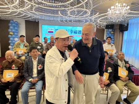 联邦参议院少数党领袖舒默(Chuck Schumer)和华商会首席顾问杜彼得。
