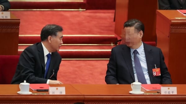 图为2019年3月15日，中共党魁习近平（右）和中国人民政治协商会议主席汪洋（左）出席全国人民代表大会第四次全体会议。（图片来源：Andrea Verdelli/Getty Images）