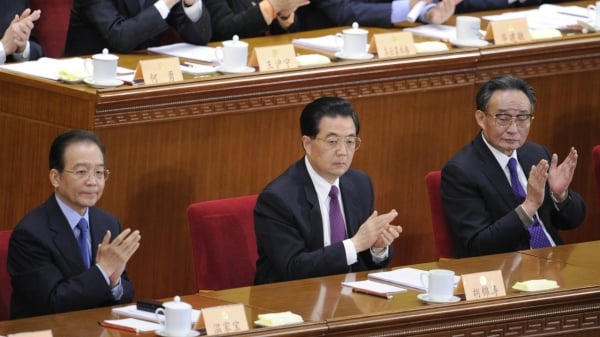 ͼΪ�й�������ϯ�����Σ��У�������Ժ�����¼ұ����󣩺�ȫ���˴�ί��ίԱ���������ң����й���������Э�̻����ʮһ��ȫ��ίԱ�ῪĻʽ�ϡ���ͼƬ��Դ��LIU JIN/AFP via Getty Images��